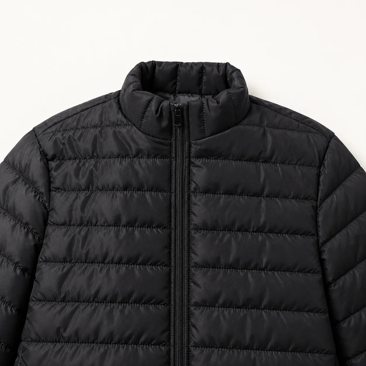 Stand collar — enlarged black quilted jacket detail